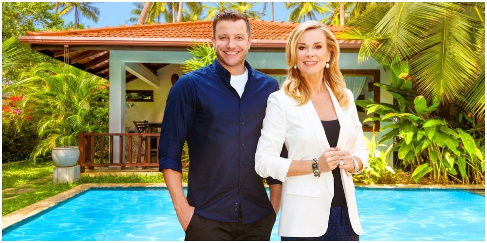 Hosts Standing In Front Of Pool And House