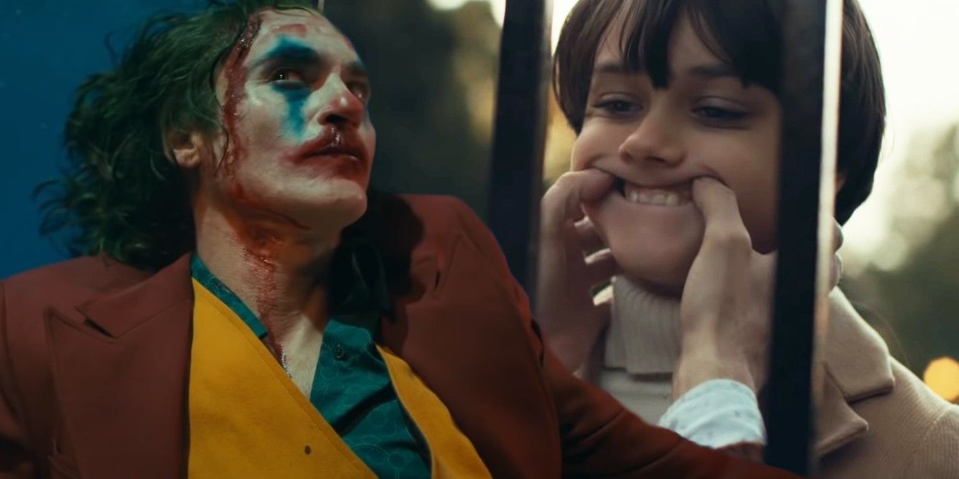 Joaquin Phoenix as Arthur Fleck Joker and Dante Pereira-Olsen as Bruce Wayne in Joker