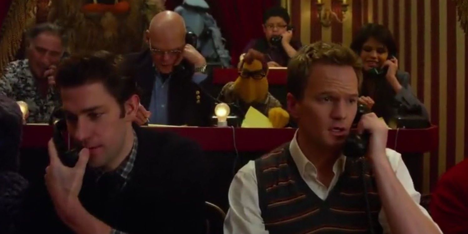 John Krasinski on the phone next to Neil Patrick Harris in the Muppets (2011)
