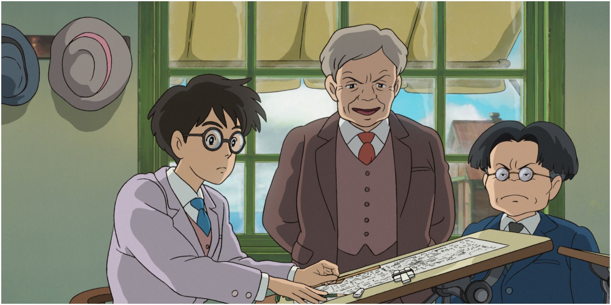 Characters in The Wind Rises gather around a drawing board
