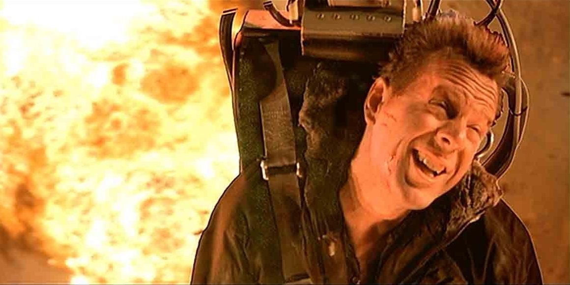 John McClane escapes an explosion in Die Hard 2