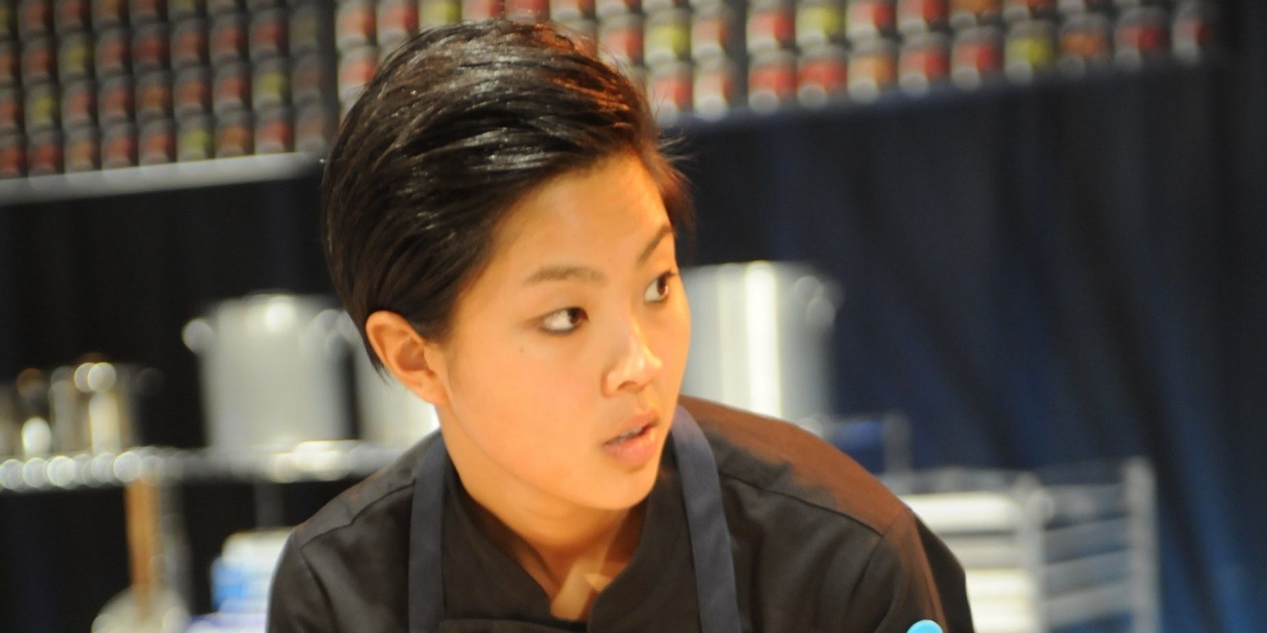 Kristen Kish looks to the side