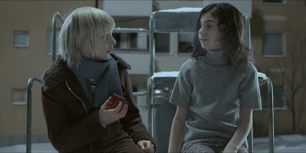 Oskar and Eli playing with a Rubix cube in Let the Right One In