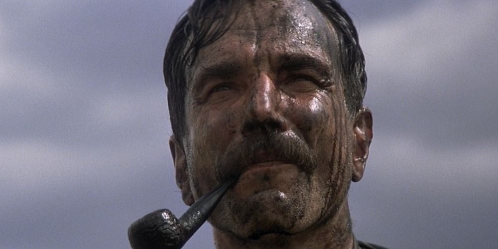 A close-up of Daniel Plainview covered in oil from There Will Be Blood