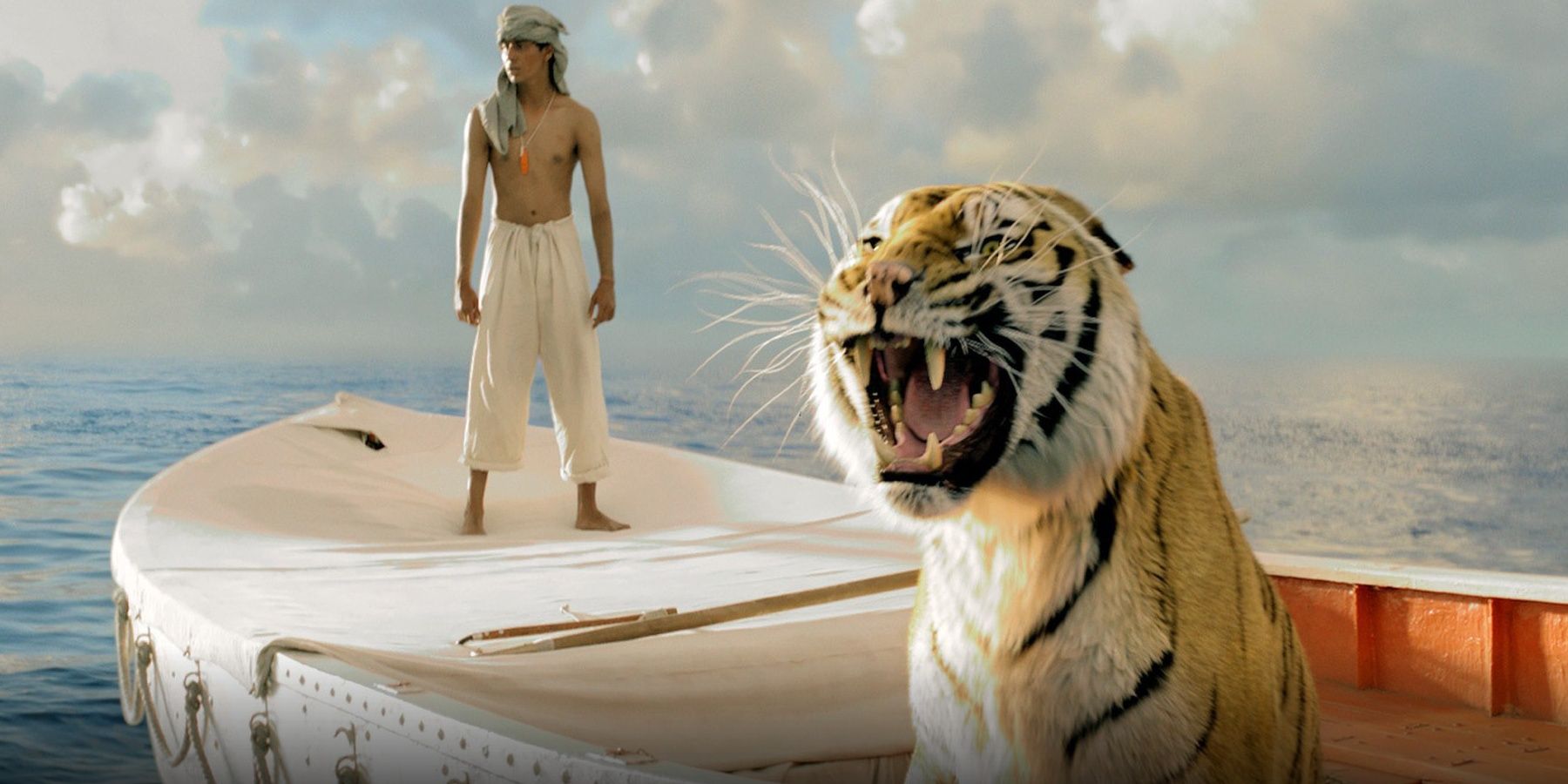 a tiger and boy on a boat in the middle of the sea Life of Pi