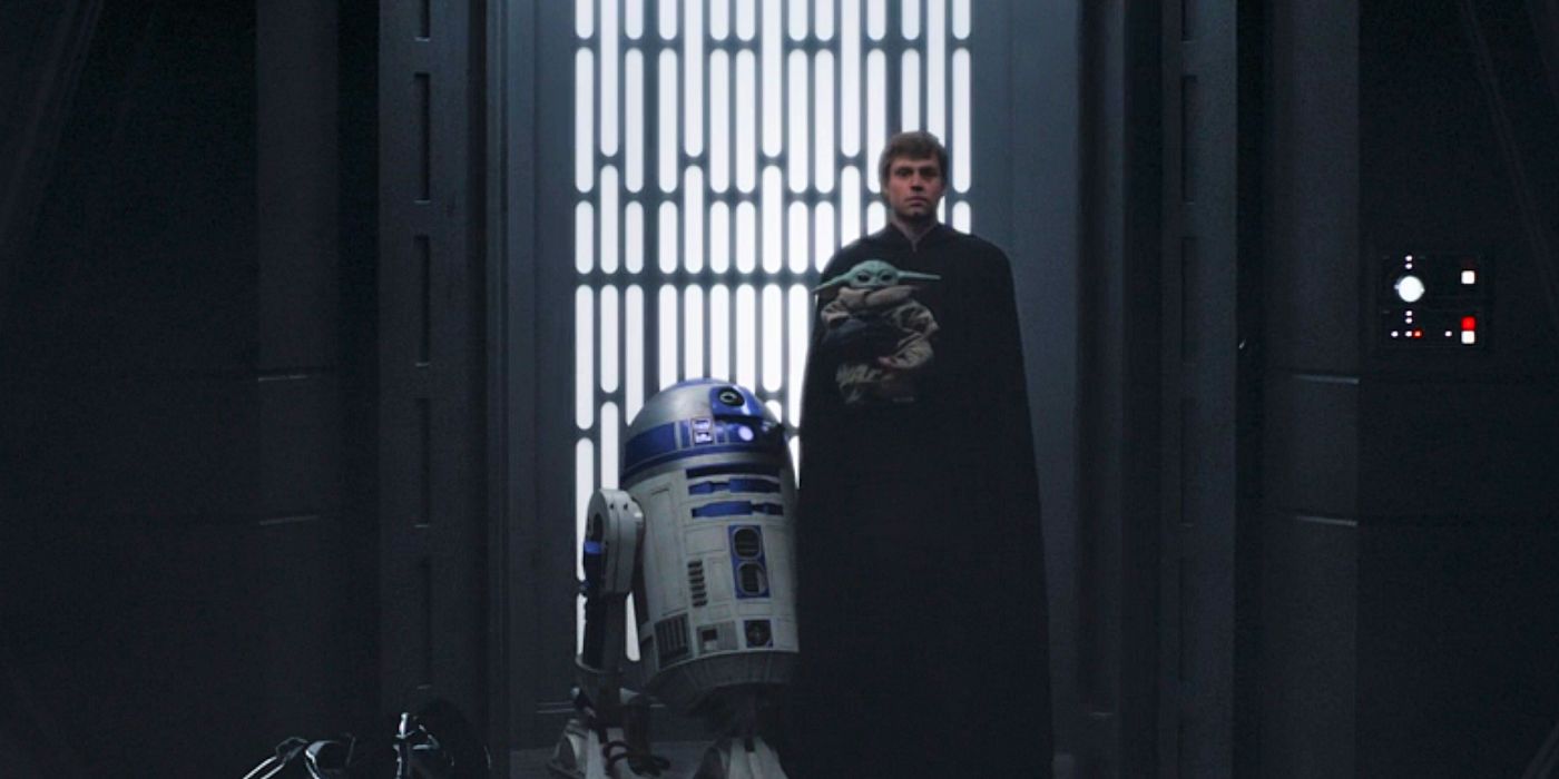 Luke Skywalker and Grogu stand with R2-D2 in The Mandalorian