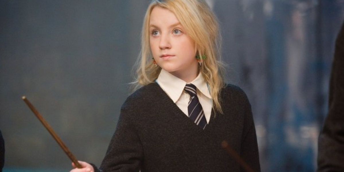 Luna Lovegood holds her wand during Dumbledore's Army meeting in Harry Potter and the Order of the Phoenix