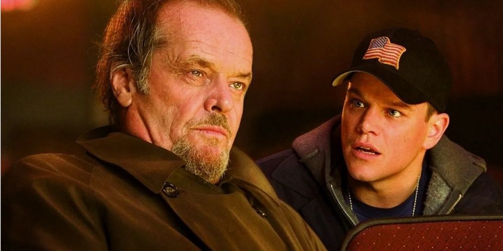 Frank and Colin talk in an adult movie theatre in The Departed