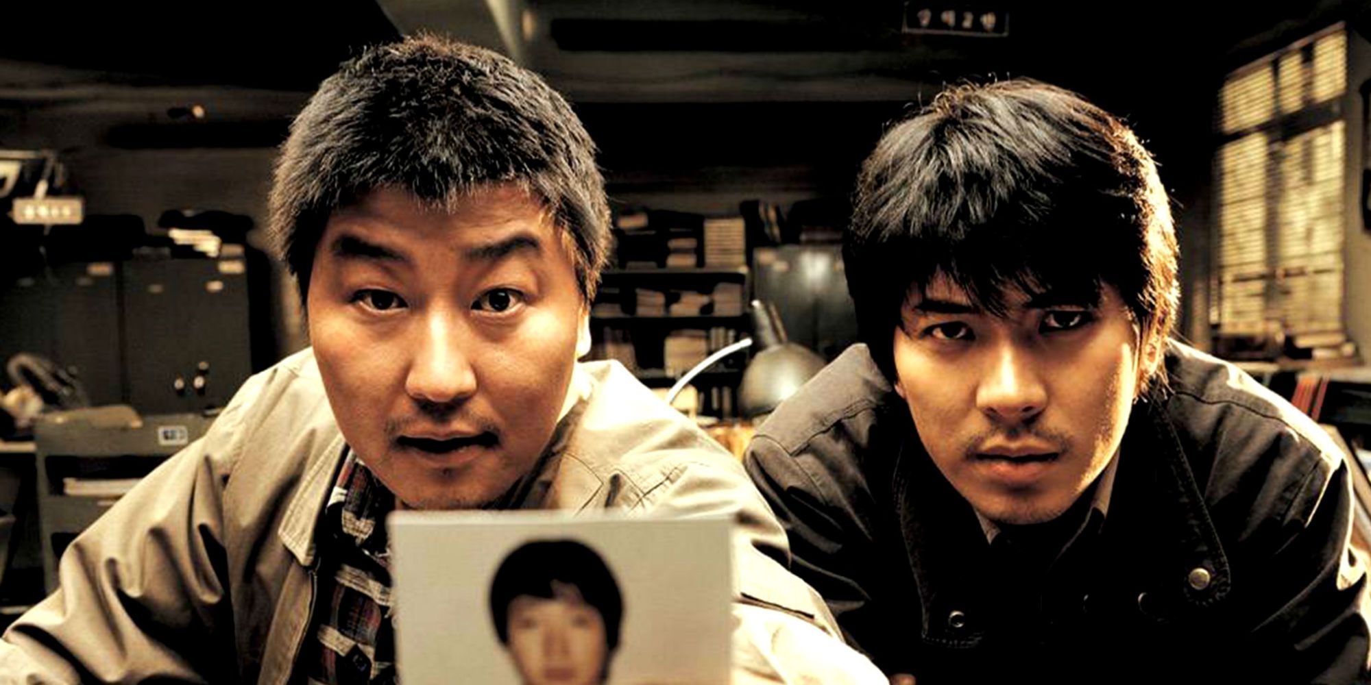 Song Kang-ho and Kim Sang-kyung in Memories Of Murder