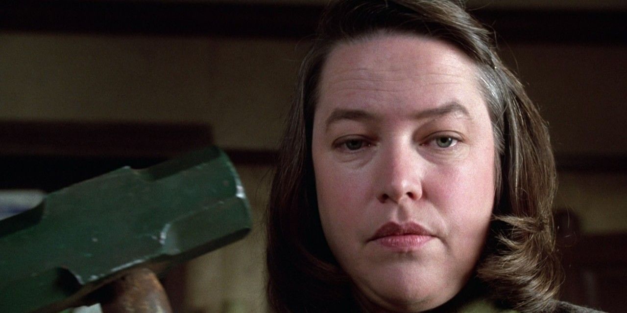 Kathy Bates as Annie Wilkes holding a knife in Misery
