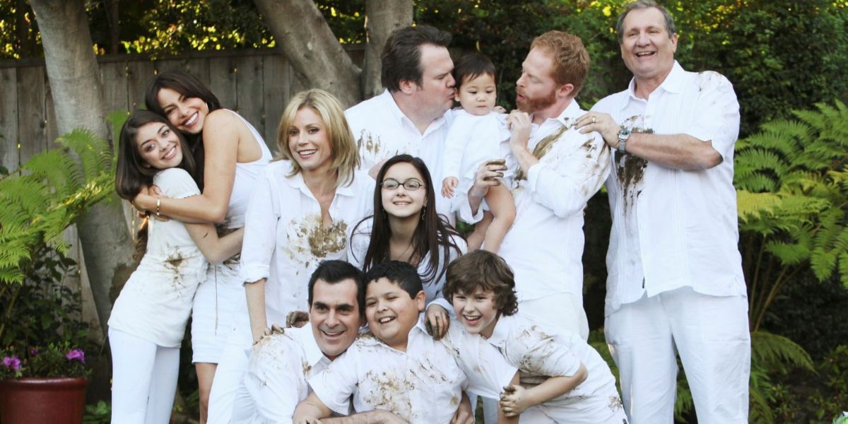 The Modern Family clan wearing white for a family photoshoot