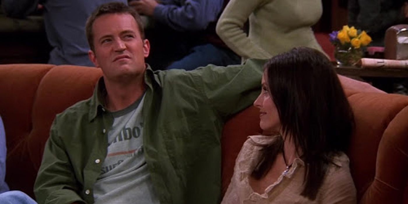 Monica and Chandler sit on a couch in Friends