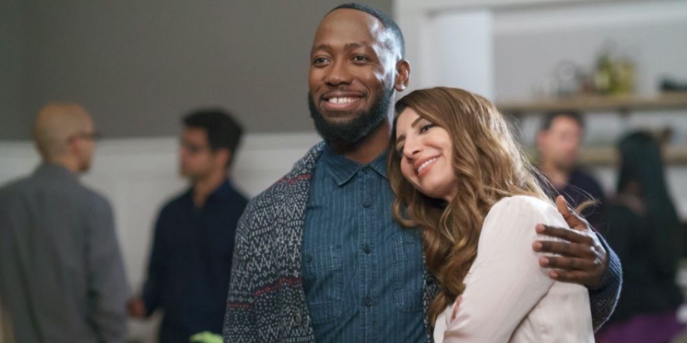 Winston puts his arm around Aly in New Girl