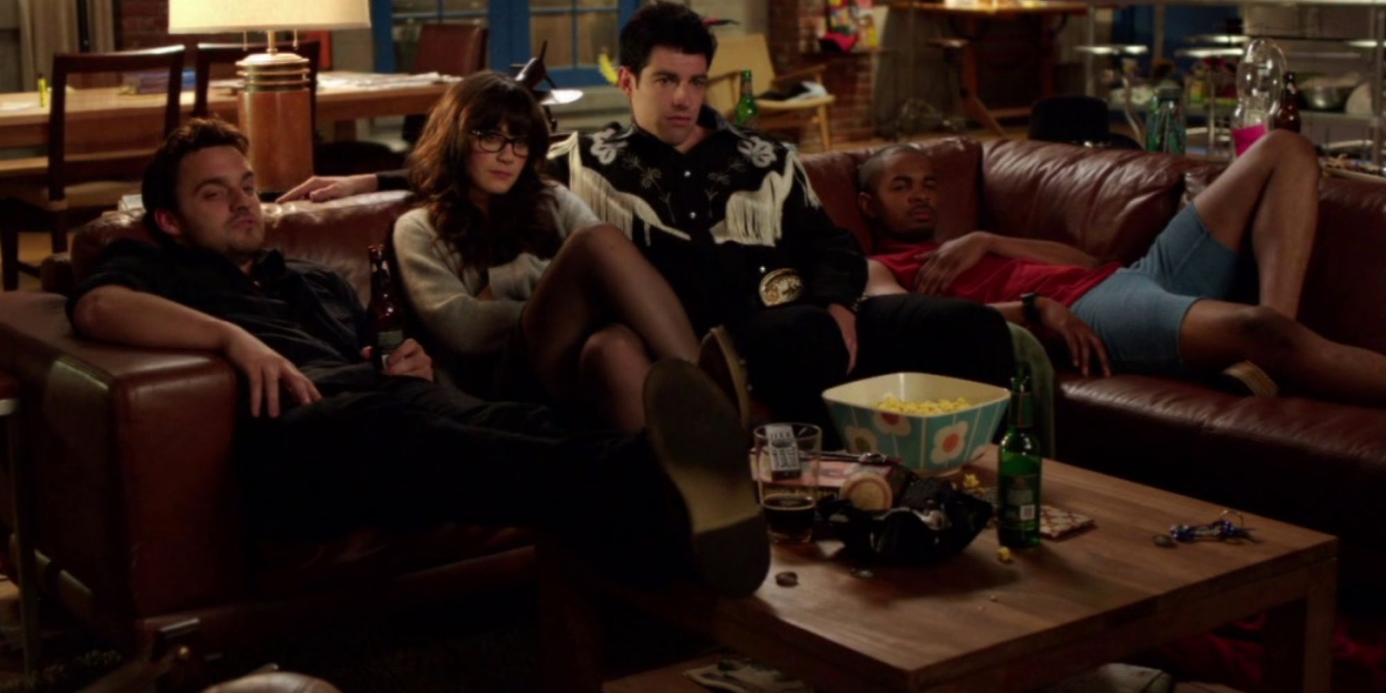 Nick, Jess, Schmidt, and Coach on the couch in the New Girl pilot