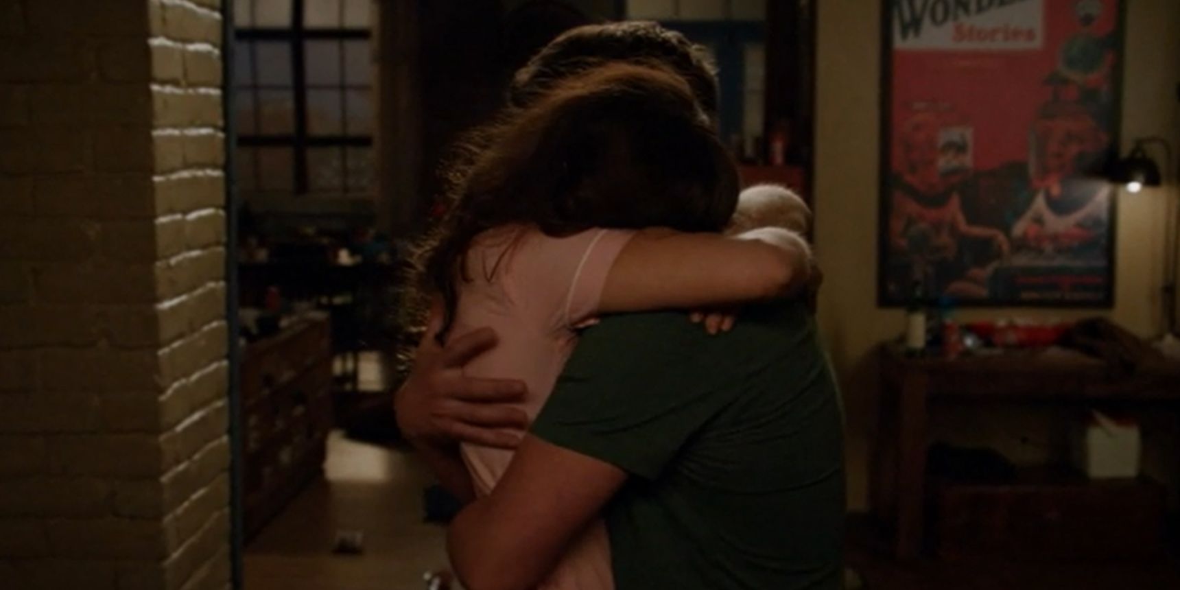 Jess and Nick hug after breaking up in New Girl