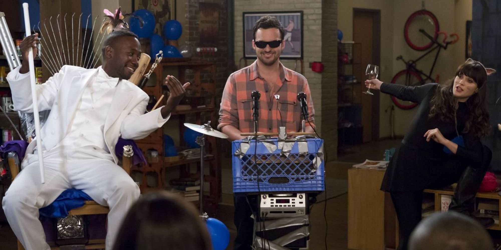 Winston, Nick, and Jess performing in costumes in New Girl