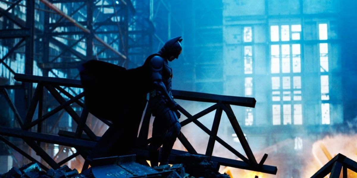 Batman looking down amongst destruction in The Dark Knight