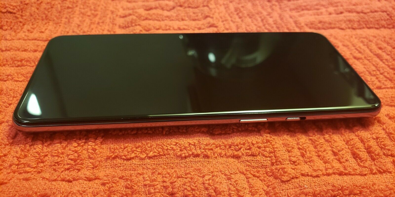 OnePlus 9 prototype eBay listing side elevation
