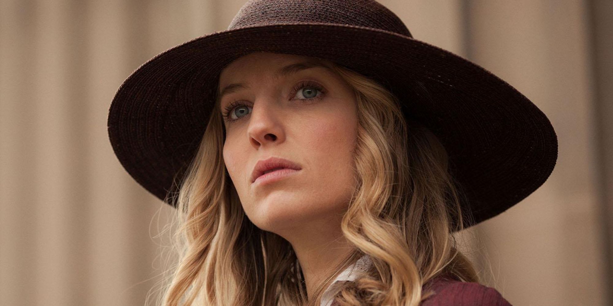 Grace Shelby (Annabelle Wallis) wearing a hat and looking curious in Peaky Blinders