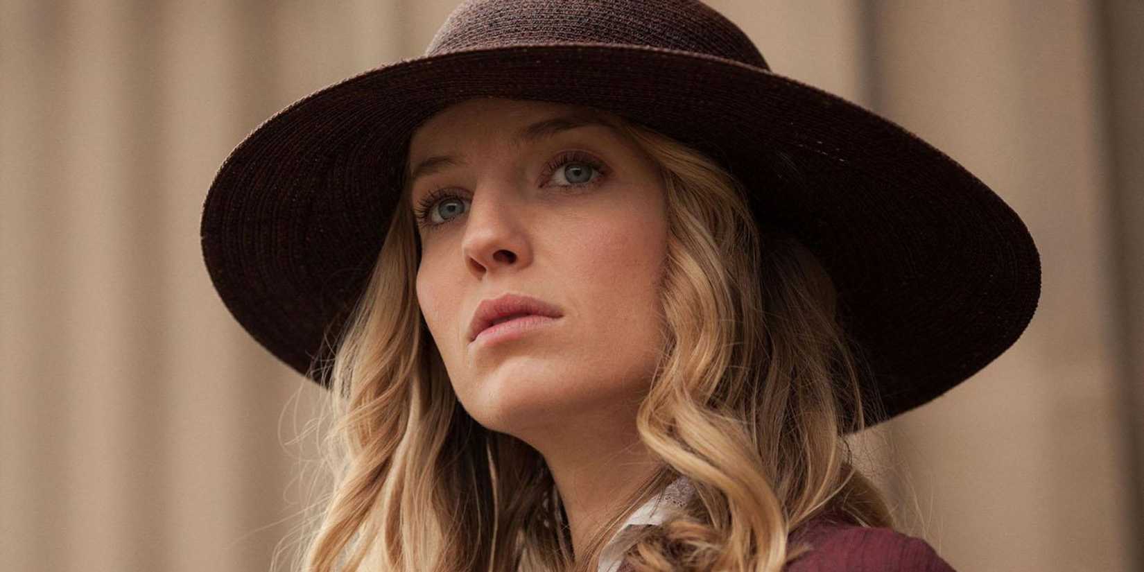 Grace Shelby (Annabelle Wallis) wearing a hat and looking curious in Peaky Blinders