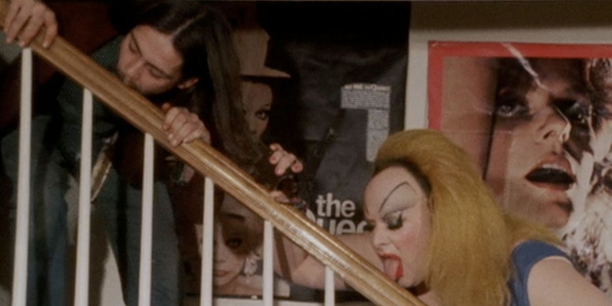 Divine licking the bannister in Pink Flamingos