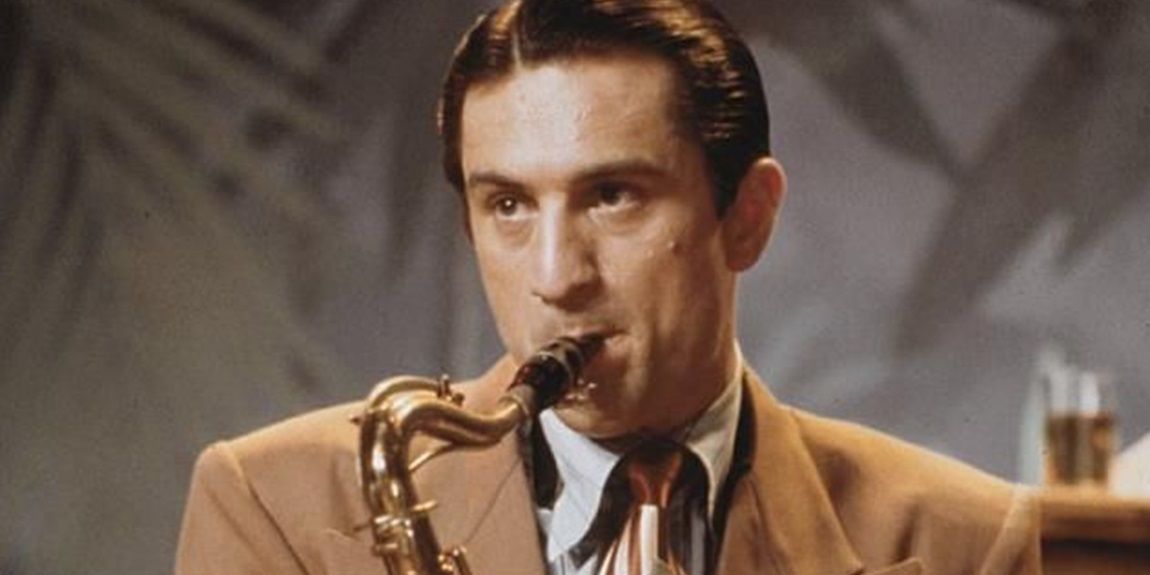 Robert De Niro playing a saxophone in New York New York