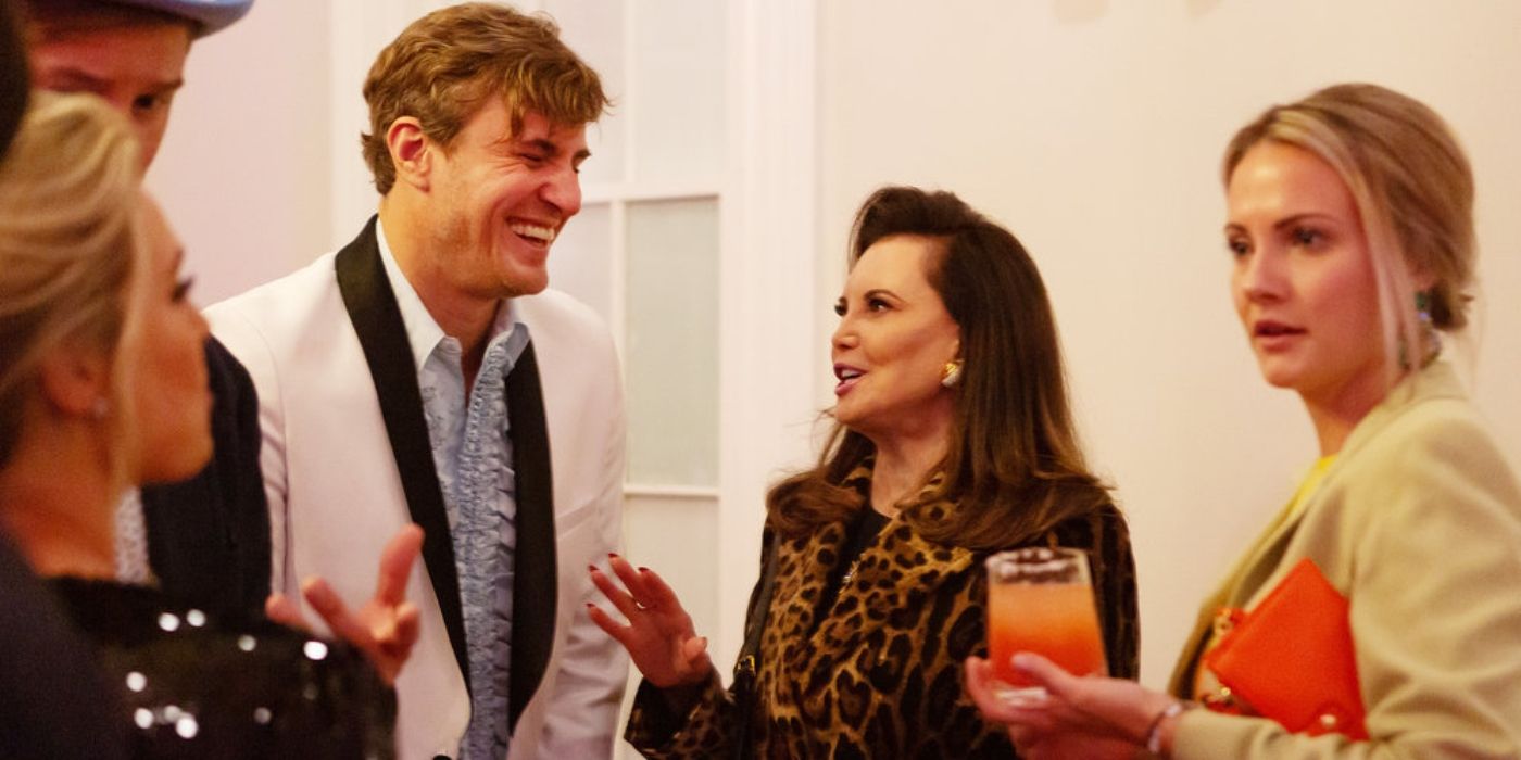 Shep and Patricia holding drinks at a party on Southern Charm