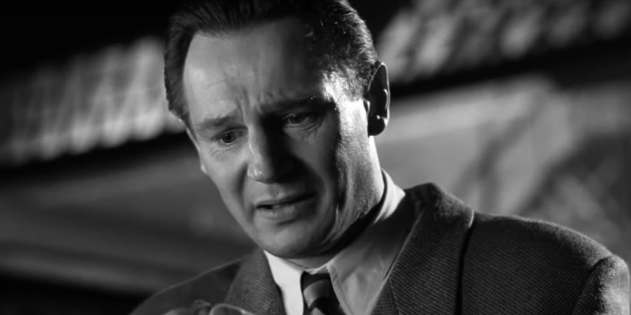 Liam Neeson as Oskar Schindler looking pained in Schindler's List