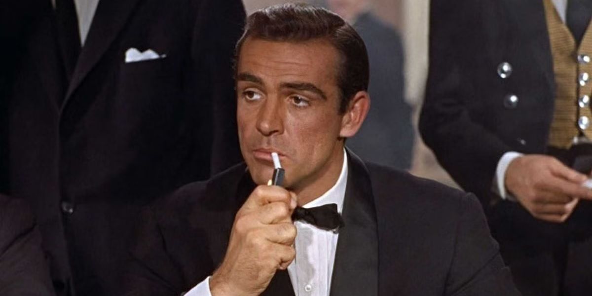 Sean Connery as James Bond lighting a cigarette in Dr. No.