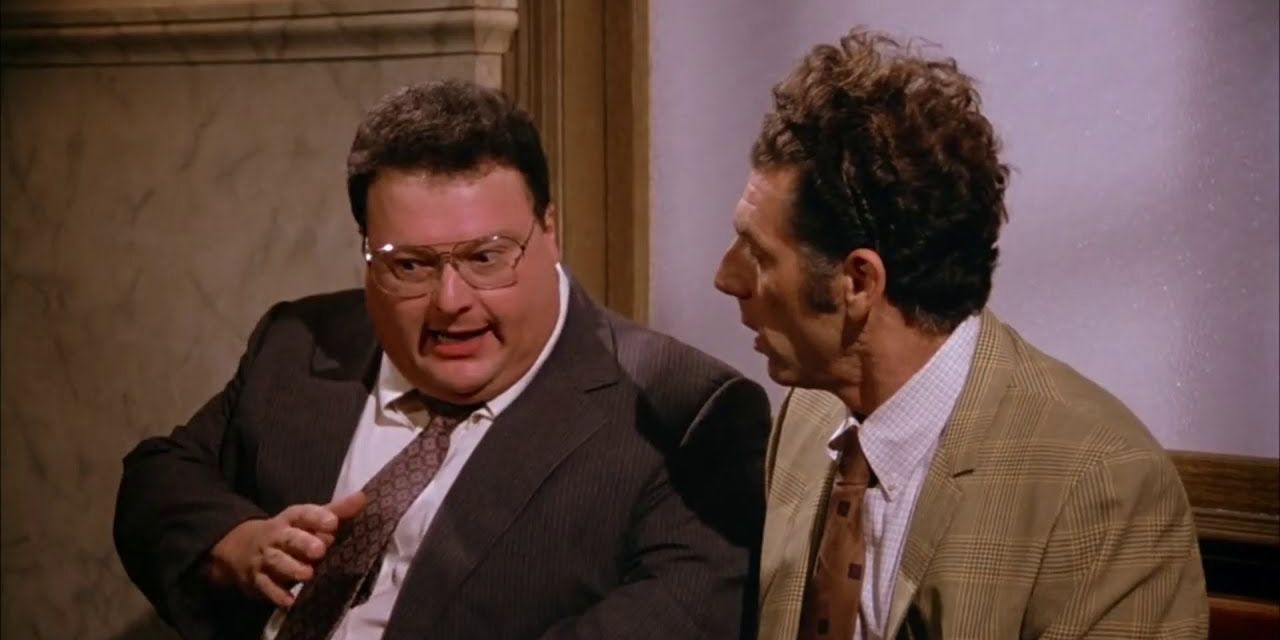 Newman and Kramer talking in suits on Seinfeld