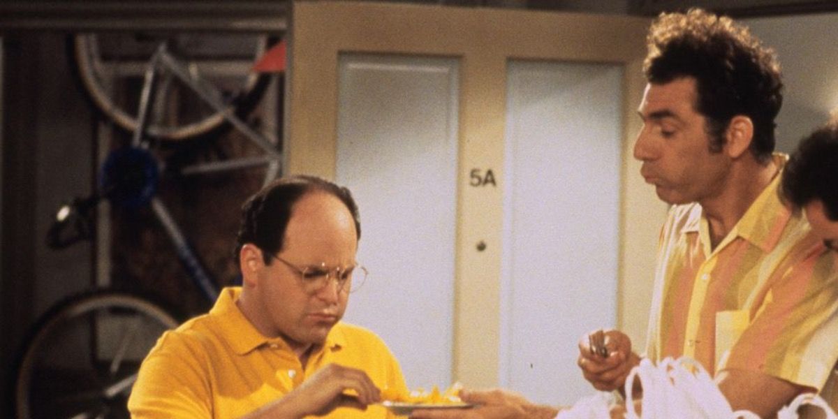 George and Kramer eating mango in Seinfeld