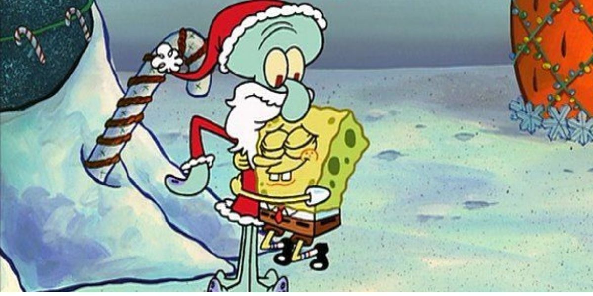 Spongebob hugging Squidward who is dressed like Santa