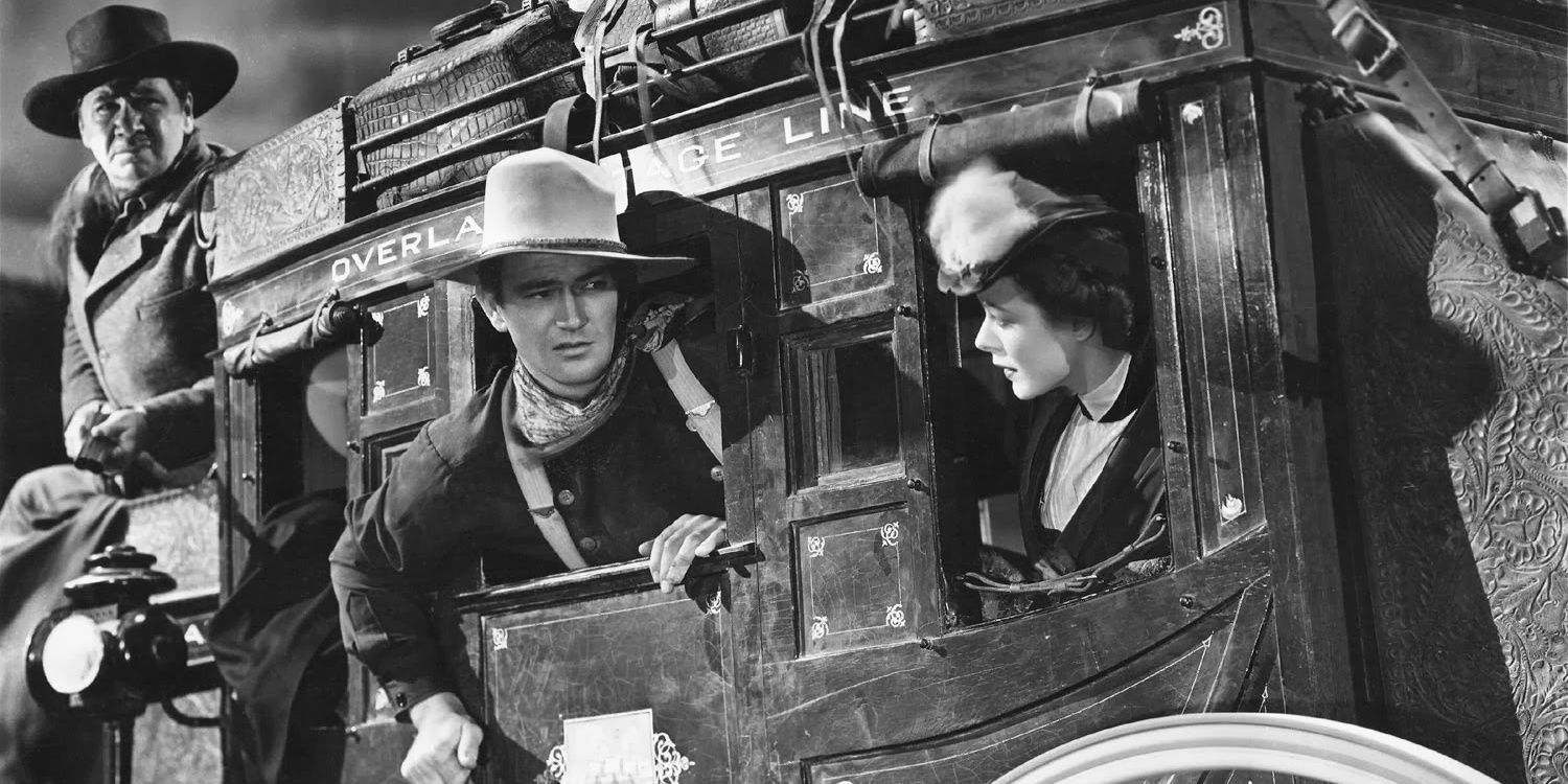 Ringo Kid looks out of the stagecoach in Stagecoach