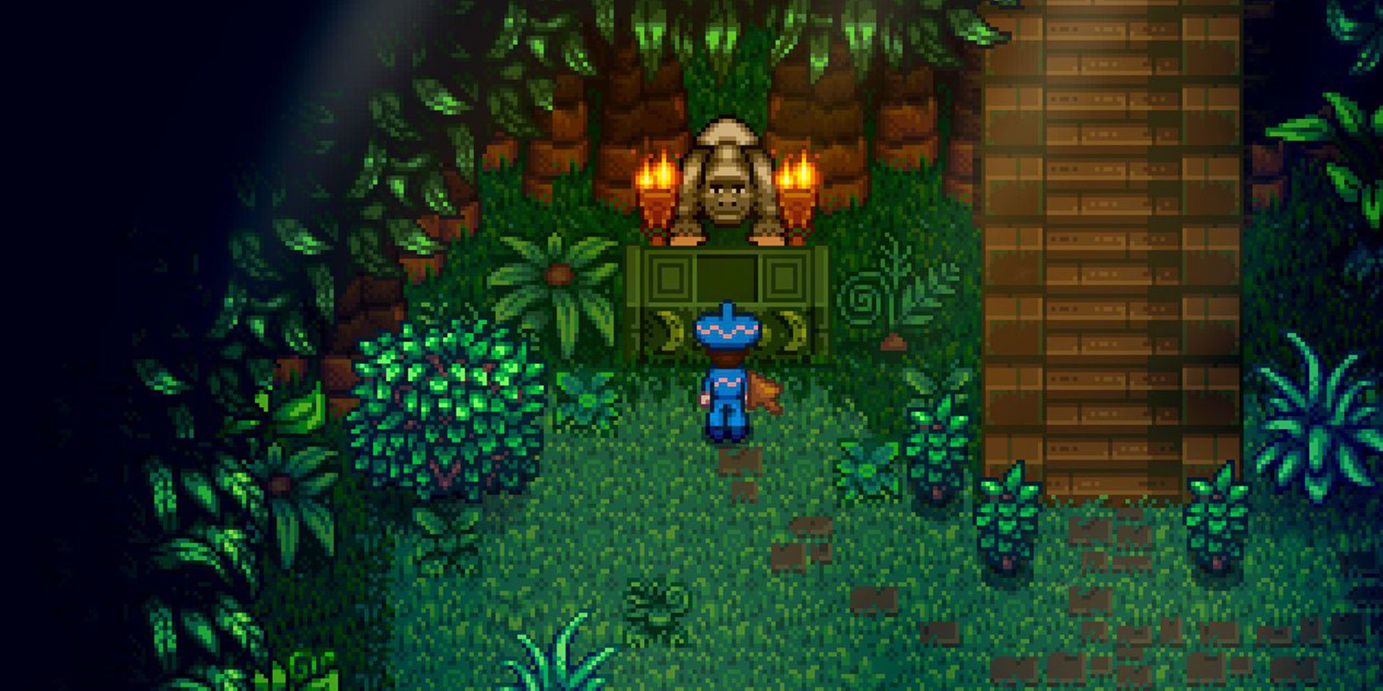 A player character lighting the two torches surrounding the Banana Shrine in Stardew Valley
