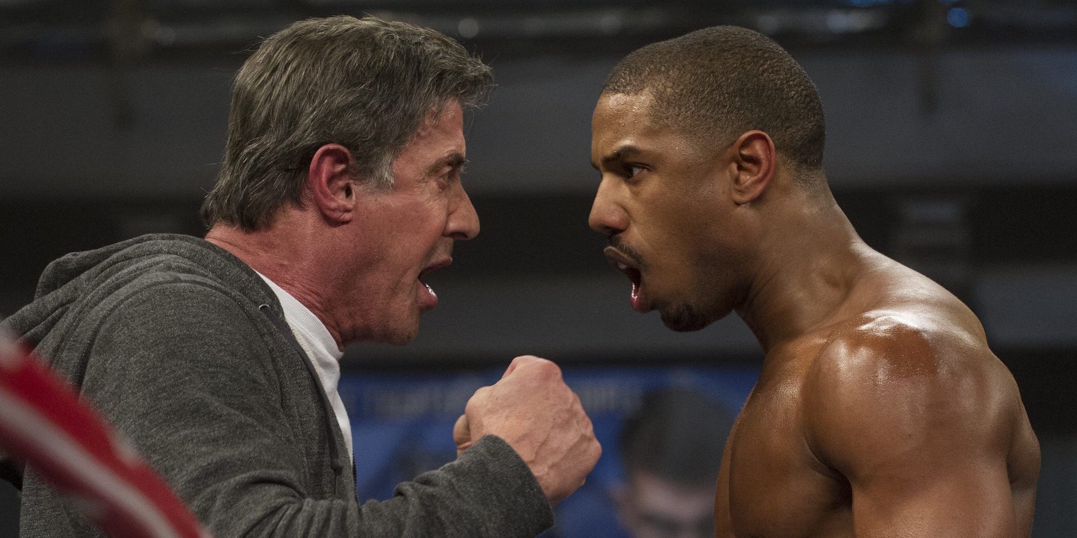 Sylvester Stallone and Michael B Jordan talking in the ring in Creed