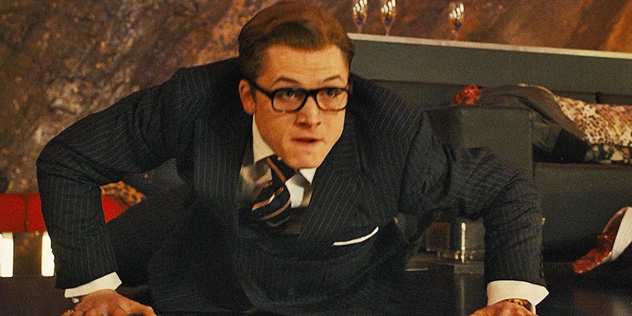 Eggsy fights in his new Kingsman suit in Kingsman The Secret Service