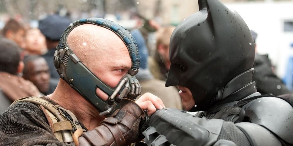 Bane catches Batman's fist in a fight in The Dark Knight Rises