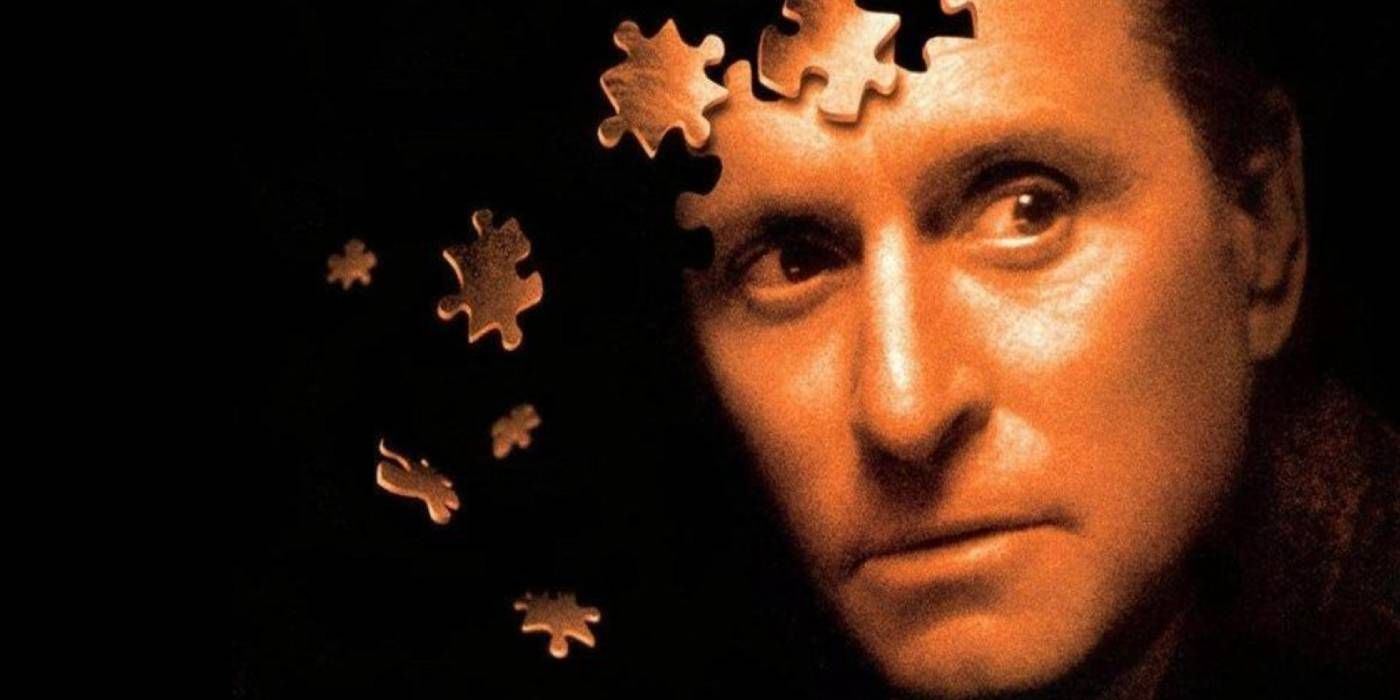 Crop of the poster for The Game with Michael Douglas' face falling away into jigsaw pieces