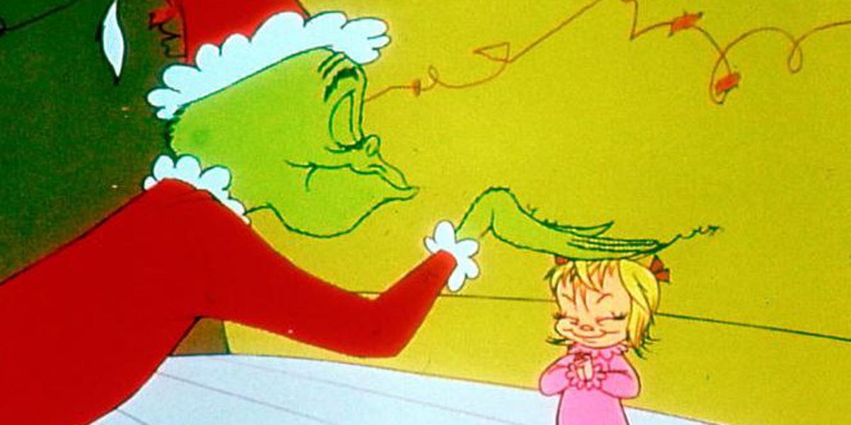 O Grinch dá um tapinha na cabeça de Cindy na versão de 1966 de How The Grinch Stole Christmas