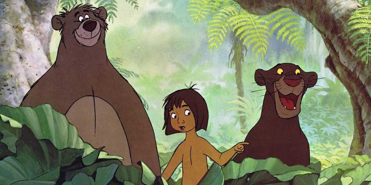 Mowgli, Baloo, and Bagheera hiding behind bushes in The Jungle Book 1967