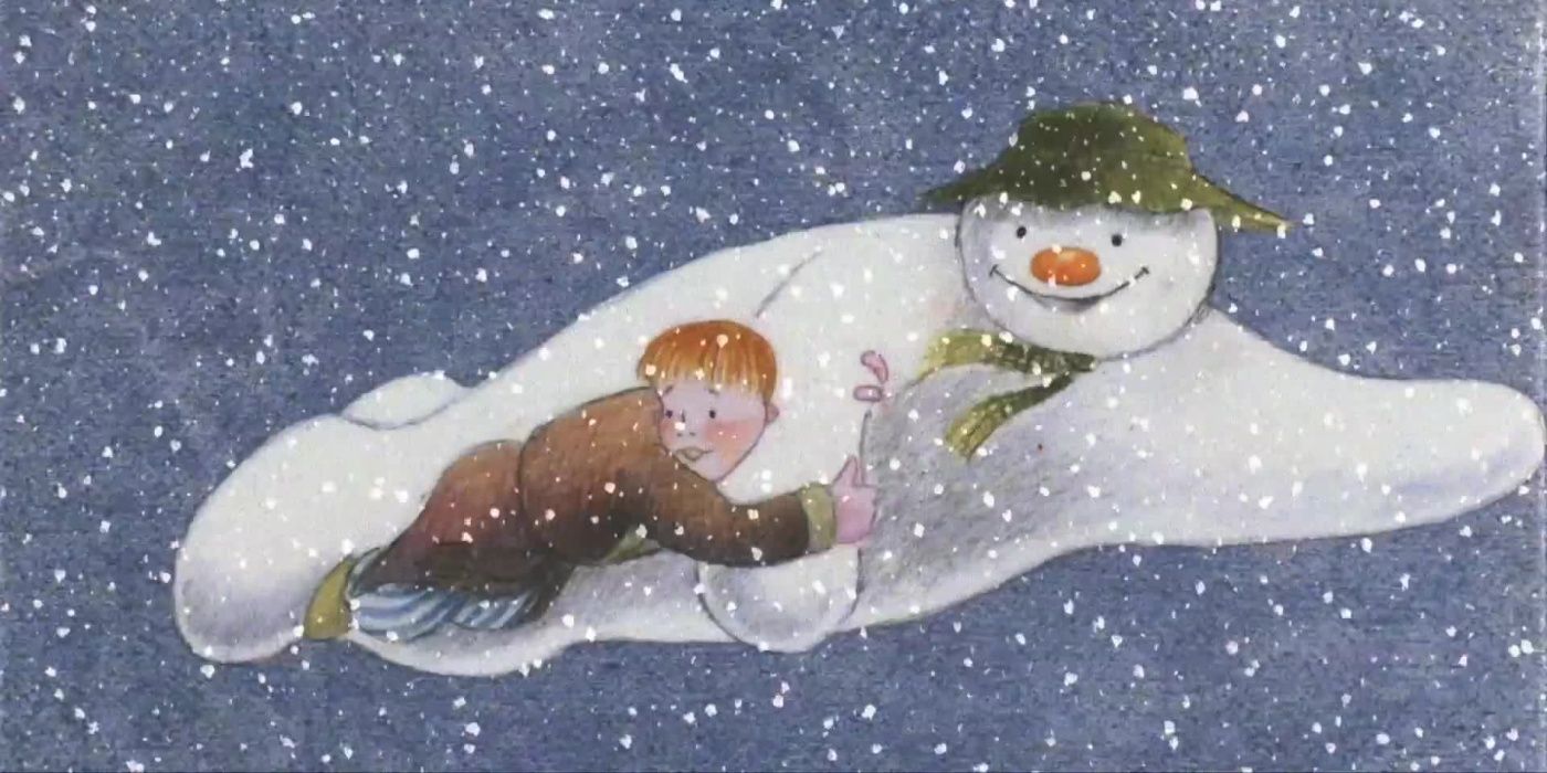 James and the Snowman fly through the air in The Snowman (1982)