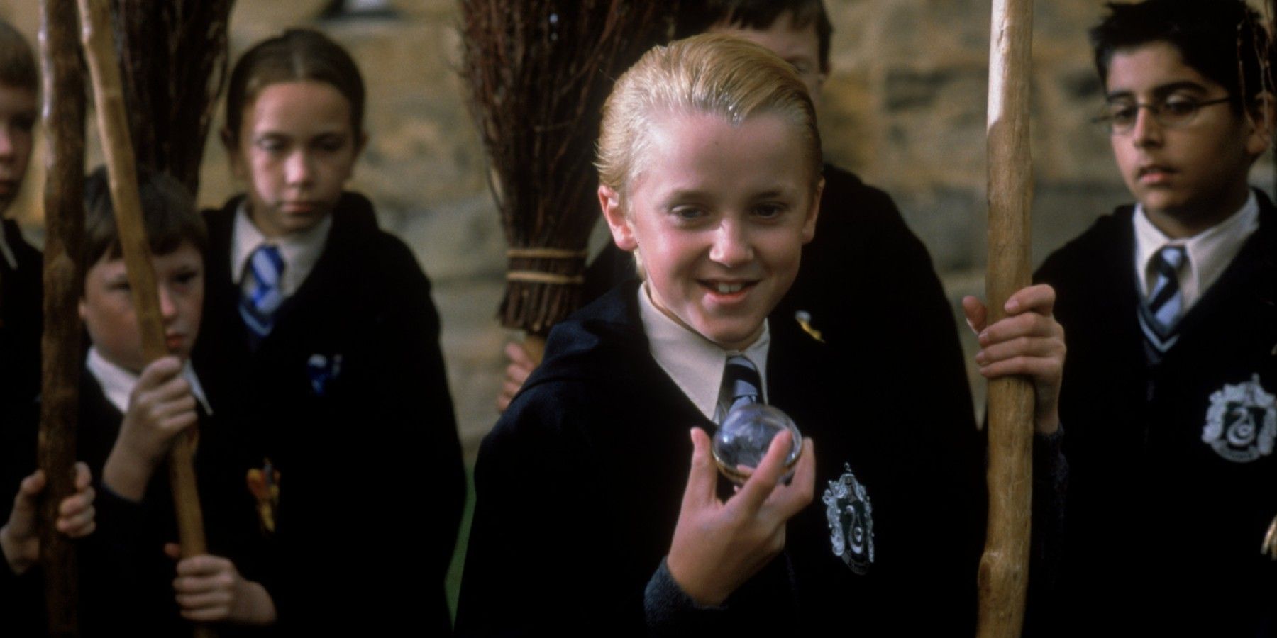 Tom Felton como Draco Malfoy em Harry Potter e a Pedra Filosofal