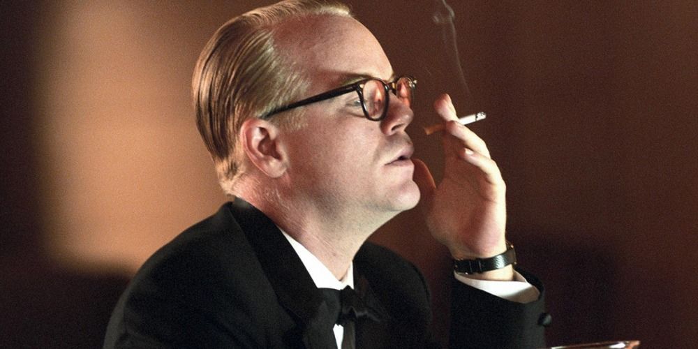 Philip Seymour Hoffman as Truman Capote smoking a cigarette in Capote