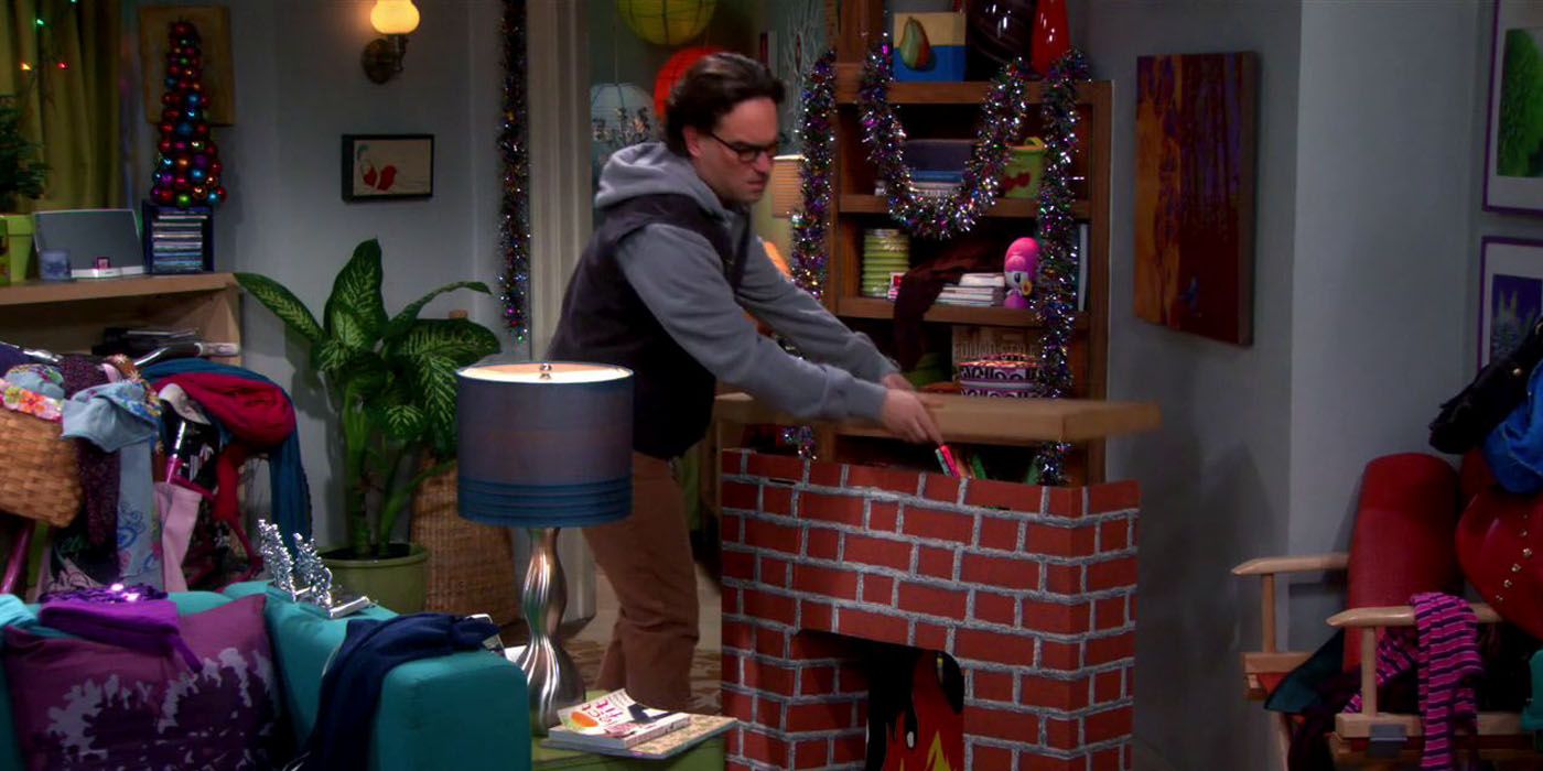 Leonard putting up fake fireplace big bang theory