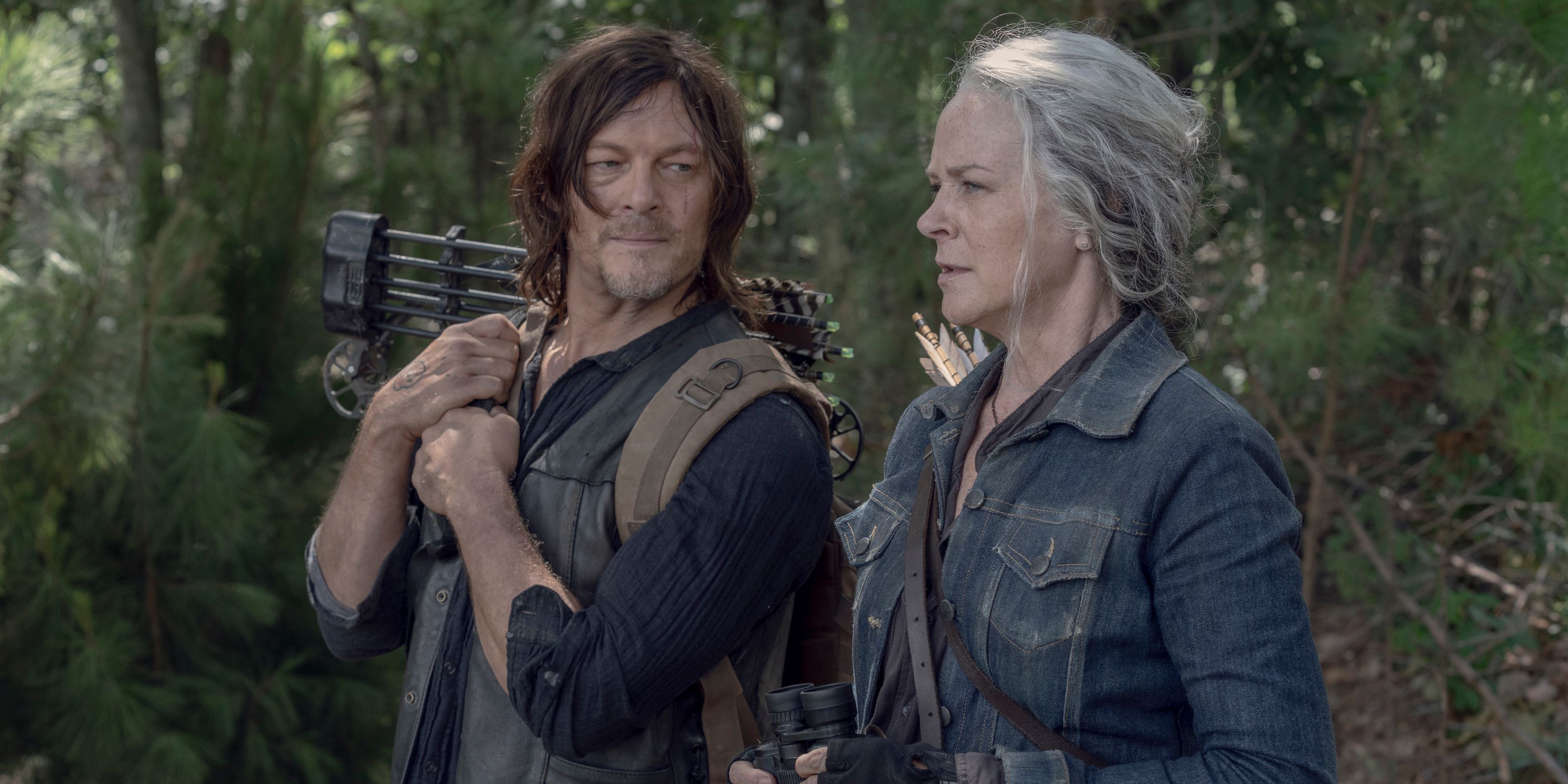 Carol and Daryl from The Walking Dead walking outside together.