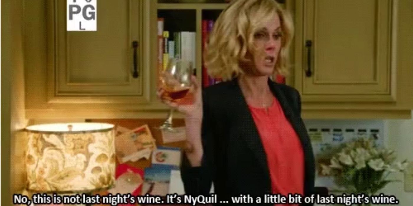 claire drinking wine - modern family