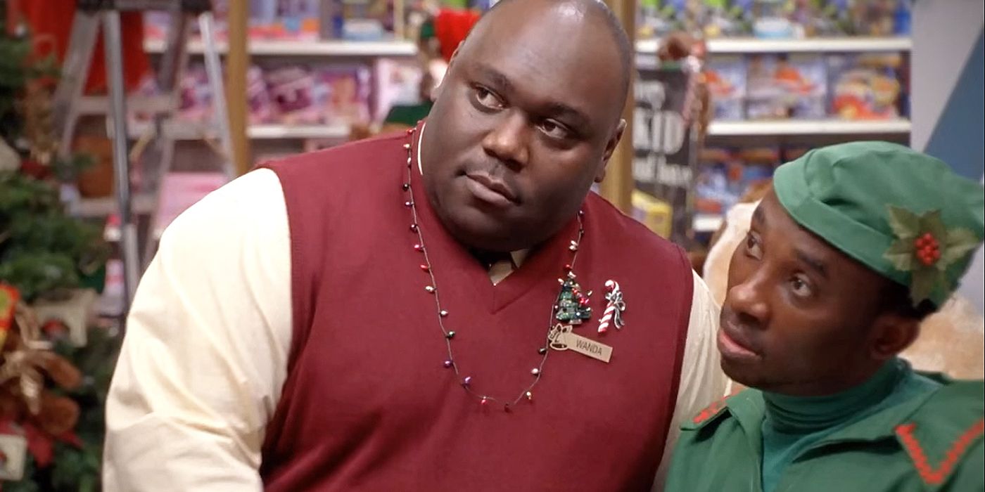 Faizon Love in Elf looking off to the side.