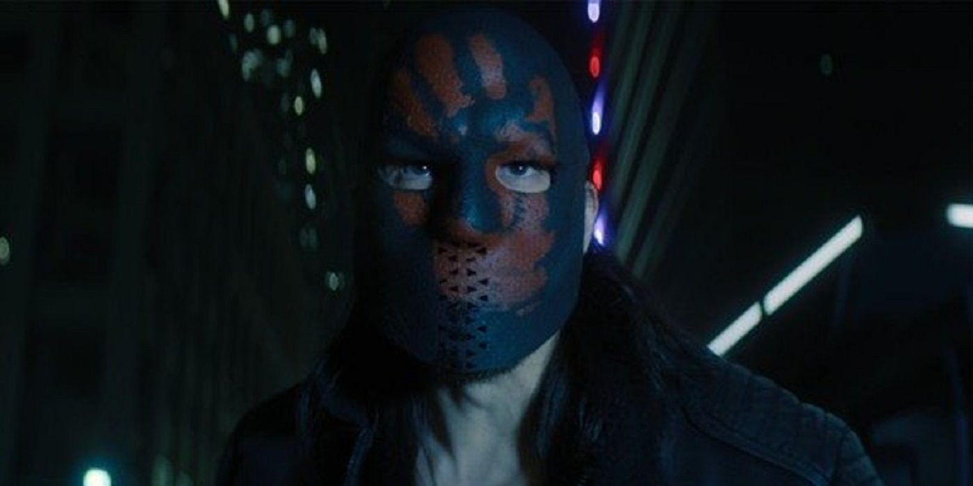 A close-up of a Flag-Smasher with their signature black mask with a red hand print in The Falcone and the Winter Soldier