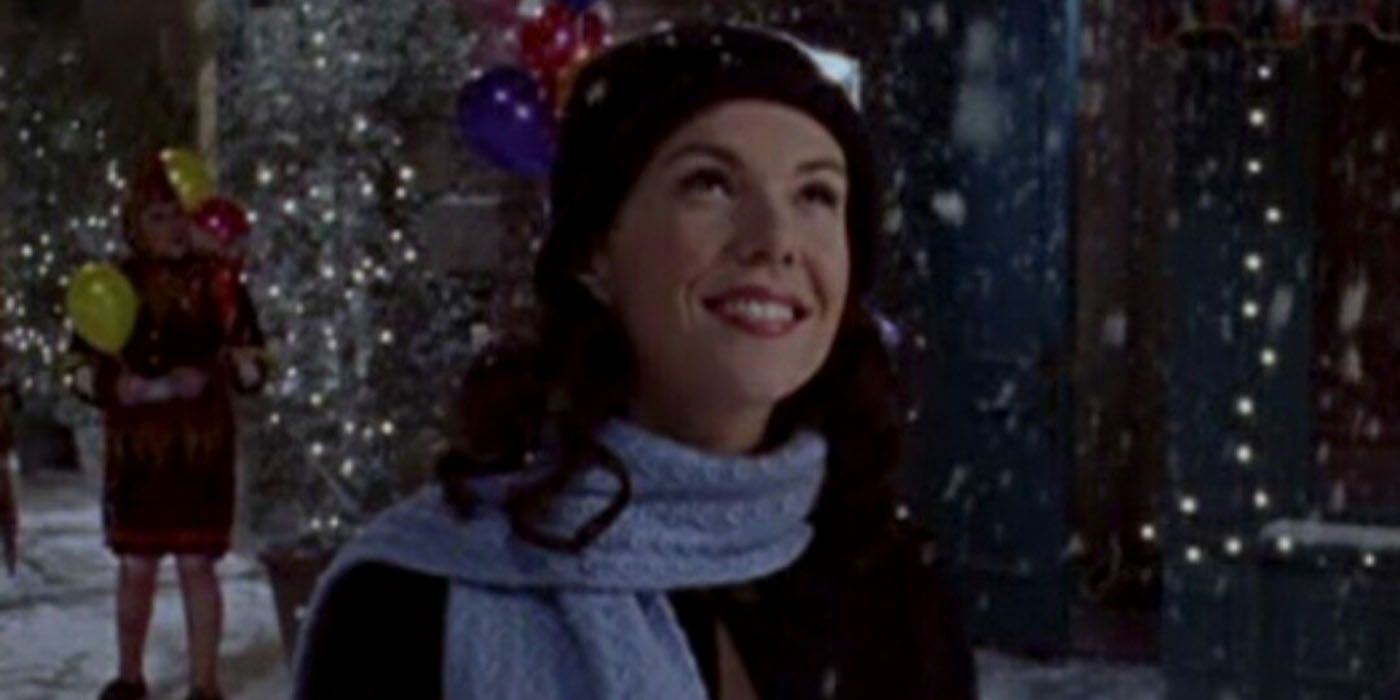Lorelai lacht in de sneeuw in Gilmore Girls