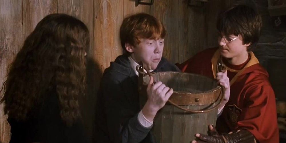 Ron spitting up slugs in Harry Potter.